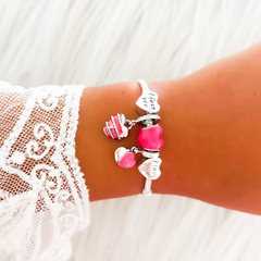 PULSERA CON CHARMS ¨I LOVE YOU¨ - DIJES FUCSIA - comprar online